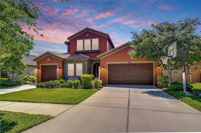 4289 Ortona Ln, Wesley Chapel, FL 33543 - view of front of property featuring concrete driveway, a garage, and stucco siding