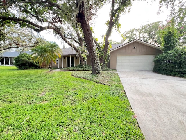 3907 Applegate Cir, Brandon, FL 33511 - ranch-style house featuring driveway, a front lawn, and an attached garage
