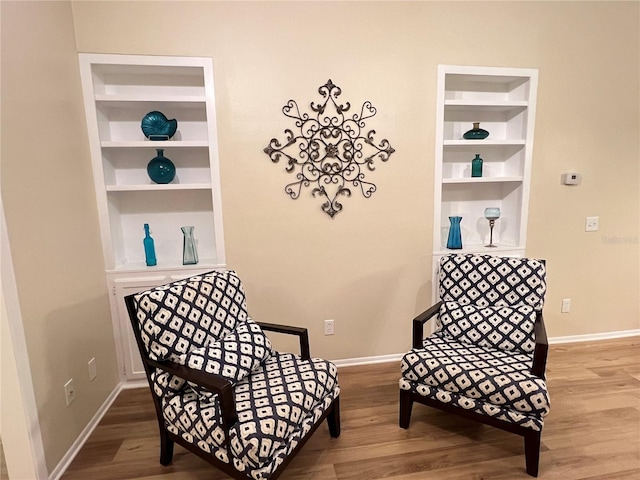 3907 Applegate Cir, Brandon, FL 33511 - sitting room featuring wood finished floors and built in features