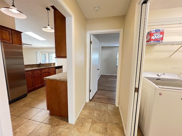 3907 Applegate Cir, Brandon, FL 33511 - hall featuring washer / dryer and baseboards