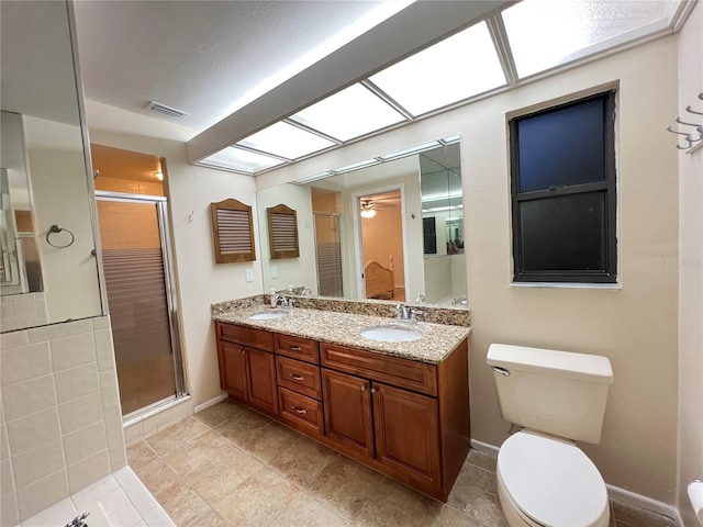 3907 Applegate Cir, Brandon, FL 33511 - bathroom with a stall shower, double vanity, and ceiling fan