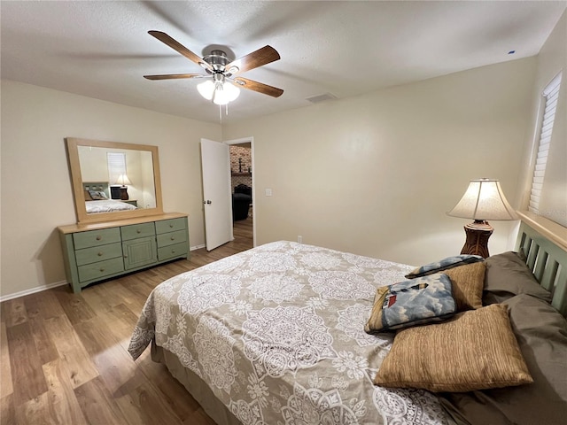 3907 Applegate Cir, Brandon, FL 33511 - bedroom featuring wood finished floors and ceiling fan