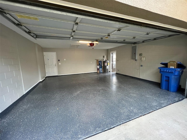 3907 Applegate Cir, Brandon, FL 33511 - garage featuring electric panel, water heater, concrete block wall, and a garage door opener