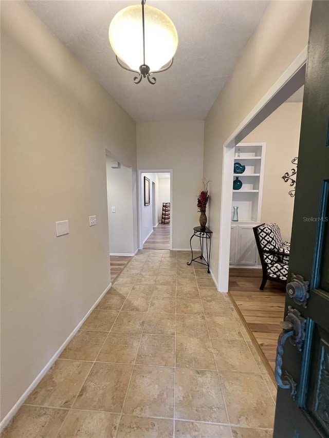 3907 Applegate Cir, Brandon, FL 33511 - hallway with baseboards and a textured ceiling