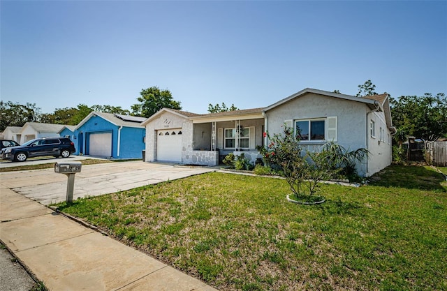 7420 Cay Dr, Port Richey, FL 34668 - ranch-style house with a garage, stucco siding, driveway, and a front yard