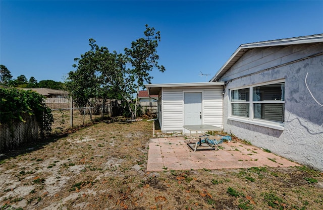 7420 Cay Dr, Port Richey, FL 34668 - view of yard with a fenced backyard and a patio area