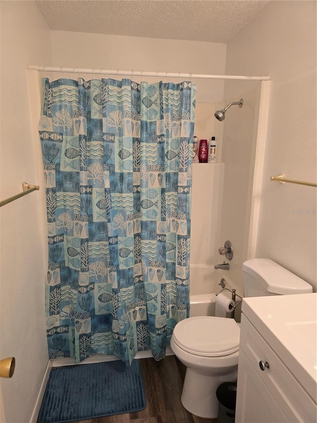 bathroom with shower / bath combination with curtain, toilet, wood finished floors, and a textured ceiling