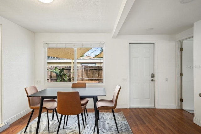 3600 46th St N, Saint Petersburg, FL 33713 - dining area featuring baseboards and wood finished floors