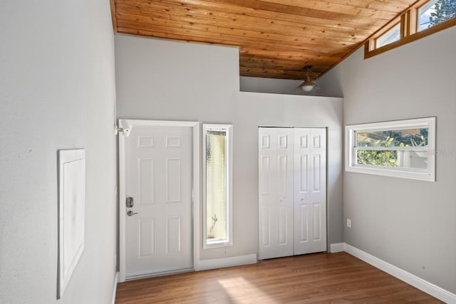 3600 46th St N, Saint Petersburg, FL 33713 - unfurnished bedroom featuring wooden ceiling, baseboards, high vaulted ceiling, and wood finished floors
