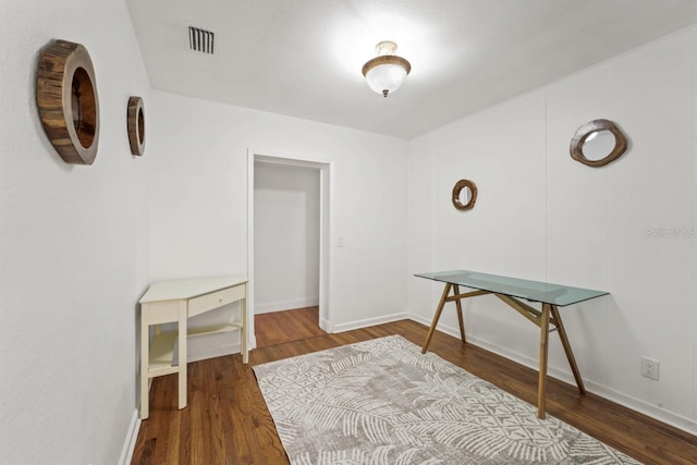3600 46th St N, Saint Petersburg, FL 33713 - interior space with baseboards, wood finished floors, and visible vents