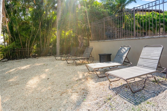 view of patio featuring fence