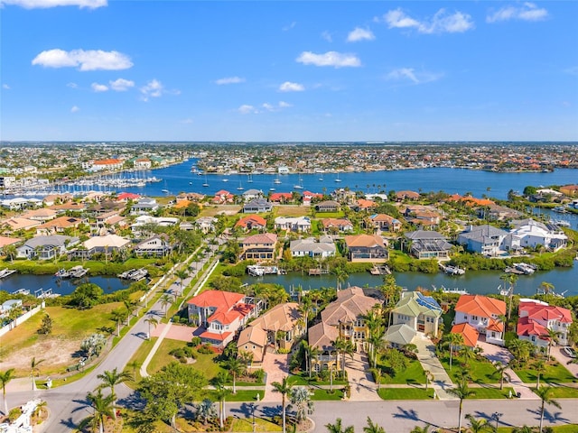 aerial view with a residential view and a water view