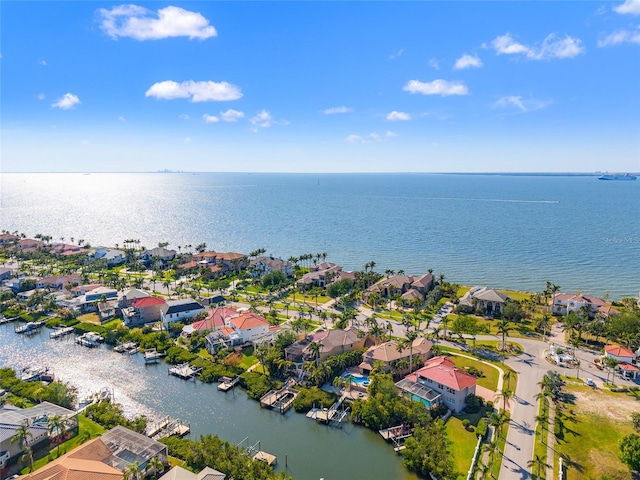 bird's eye view with a residential view and a water view