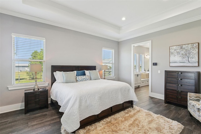 bedroom featuring baseboards, ornamental molding, a raised ceiling, and dark wood-style flooring