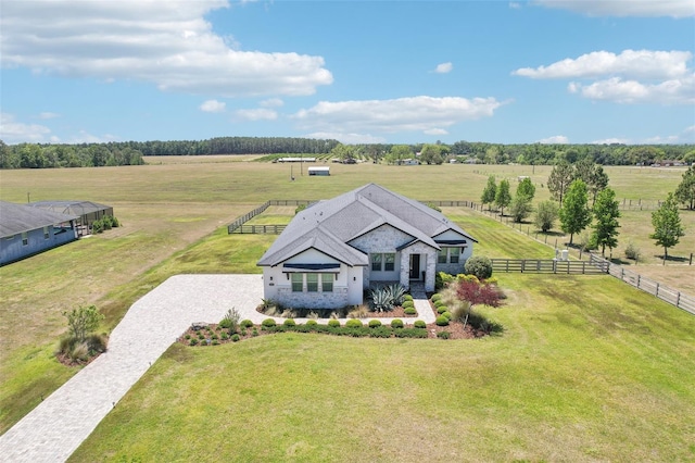 birds eye view of property with a rural view
