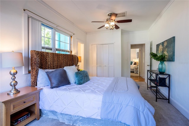 56 W Park St, Tarpon Springs, FL 34689 - carpeted bedroom with ceiling fan, baseboards, visible vents, and ornamental molding