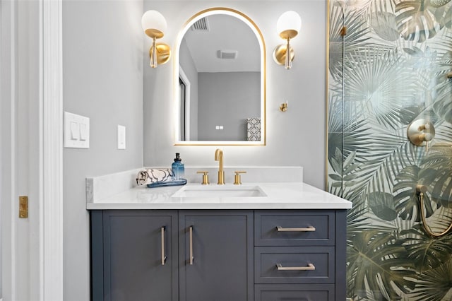 bathroom featuring visible vents and vanity
