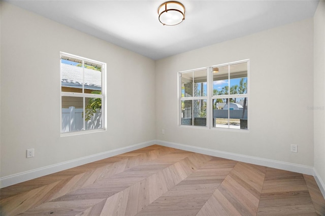 empty room with baseboards