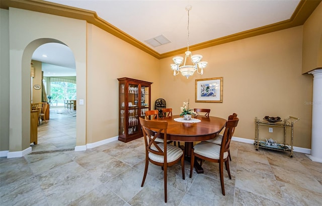 2042 Diamond Ct, Oldsmar, FL 34677 - dining space featuring a chandelier, arched walkways, visible vents, and baseboards