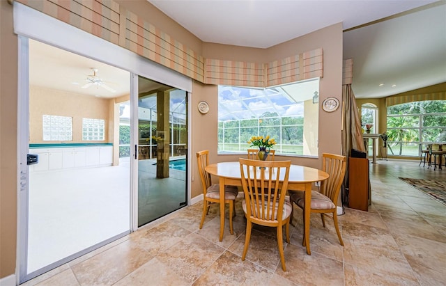 2042 Diamond Ct, Oldsmar, FL 34677 - dining space with stone finish flooring and a healthy amount of sunlight
