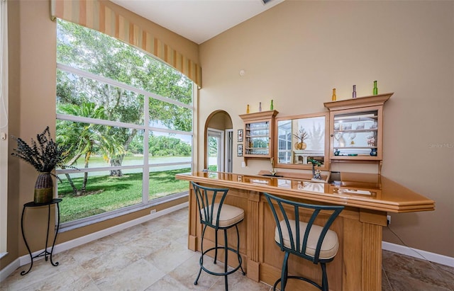 2042 Diamond Ct, Oldsmar, FL 34677 - bar featuring bar area and baseboards