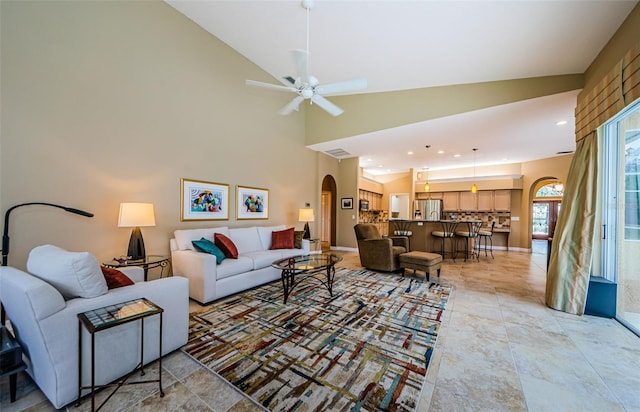 2042 Diamond Ct, Oldsmar, FL 34677 - living area featuring arched walkways, high vaulted ceiling, ceiling fan, and recessed lighting