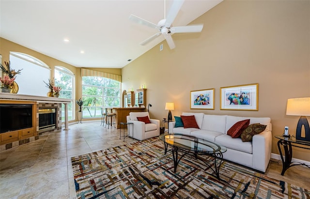 2042 Diamond Ct, Oldsmar, FL 34677 - living room featuring recessed lighting, baseboards, high vaulted ceiling, and ceiling fan