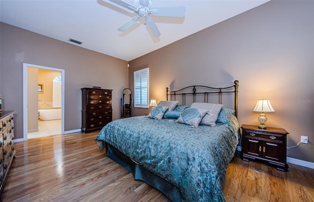 2042 Diamond Ct, Oldsmar, FL 34677 - bedroom featuring wood finished floors, visible vents, baseboards, and ceiling fan