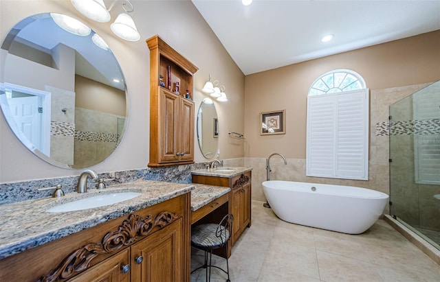 2042 Diamond Ct, Oldsmar, FL 34677 - full bathroom featuring two vanities, tile patterned flooring, a sink, and a stall shower