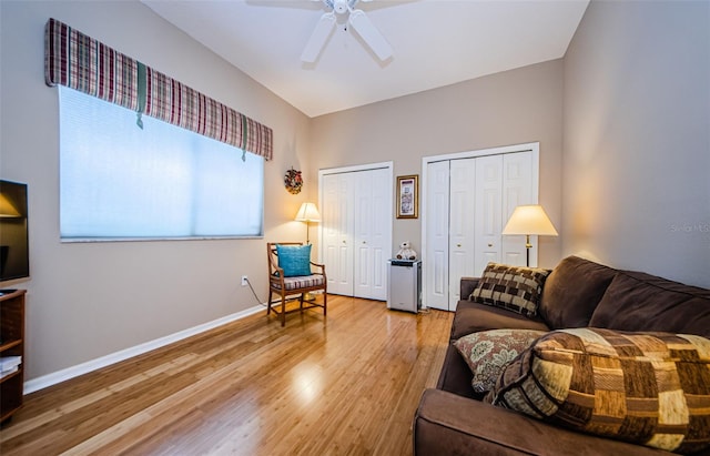 2042 Diamond Ct, Oldsmar, FL 34677 - living room with ceiling fan, baseboards, and wood finished floors