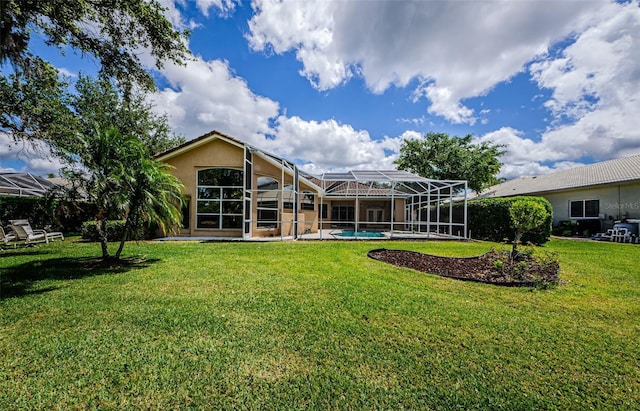 2042 Diamond Ct, Oldsmar, FL 34677 - back of house featuring stucco siding, an outdoor pool, a yard, and a lanai