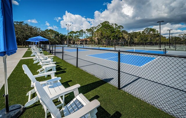 2042 Diamond Ct, Oldsmar, FL 34677 - view of tennis court with fence