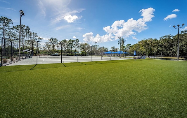 2042 Diamond Ct, Oldsmar, FL 34677 - view of tennis court featuring fence