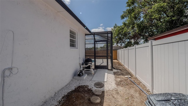 view of home's exterior with a fenced backyard and stucco siding