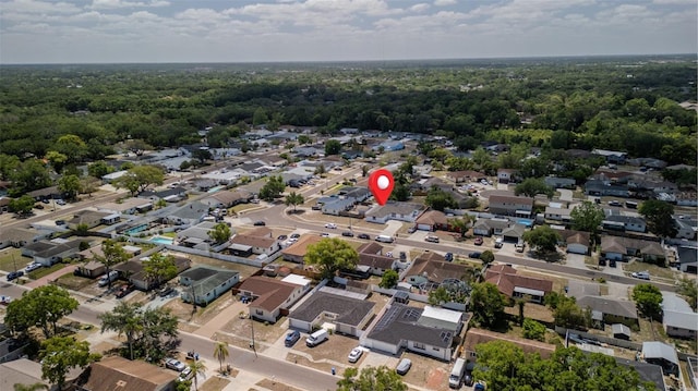 bird's eye view featuring a residential view and a forest view