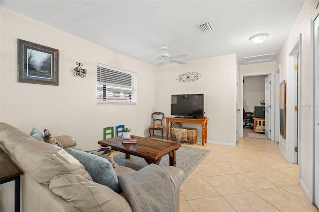 2903 W Paxton Ave, Tampa, FL 33611 - living area with light tile patterned flooring, attic access, a ceiling fan, and baseboards