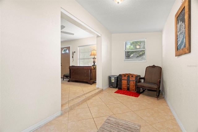 2903 W Paxton Ave, Tampa, FL 33611 - corridor featuring light tile patterned floors and baseboards