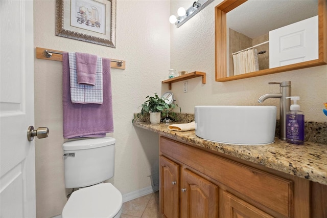 2903 W Paxton Ave, Tampa, FL 33611 - bathroom with vanity, toilet, tile patterned floors, and a shower with shower curtain