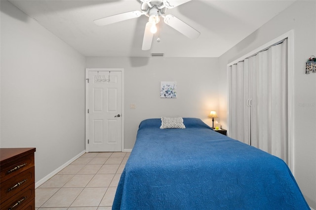 6917 Spumoni St, Sebring, FL 33872 - bedroom with light tile patterned floors, baseboards, and a ceiling fan