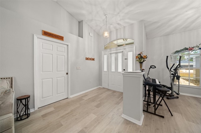 6917 Spumoni St, Sebring, FL 33872 - entryway with light wood finished floors, baseboards, and a chandelier