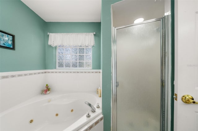 6917 Spumoni St, Sebring, FL 33872 - bathroom featuring a shower stall and a jetted tub