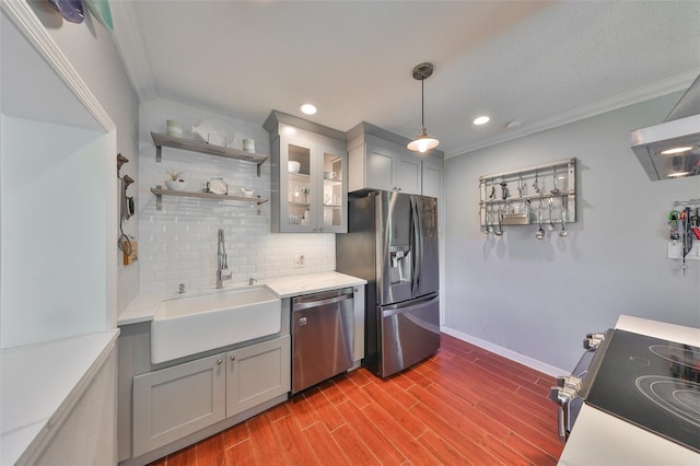 10824 Palmetto St, Riverview, FL 33569 - kitchen with appliances with stainless steel finishes, a sink, gray cabinets, backsplash, and recessed lighting