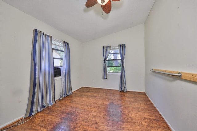 10824 Palmetto St, Riverview, FL 33569 - empty room with plenty of natural light, vaulted ceiling, a ceiling fan, and wood finished floors