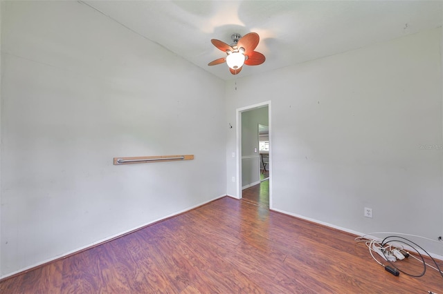 10824 Palmetto St, Riverview, FL 33569 - spare room featuring a ceiling fan, wood finished floors, and baseboards