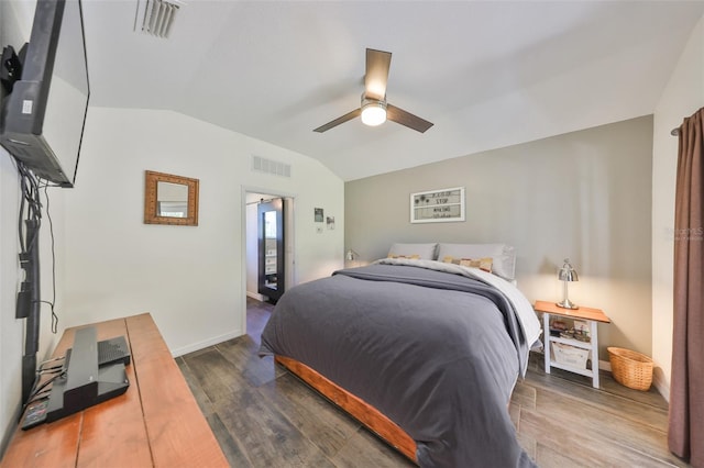 10824 Palmetto St, Riverview, FL 33569 - bedroom featuring vaulted ceiling, wood finished floors, ceiling fan, and baseboards