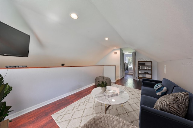 10824 Palmetto St, Riverview, FL 33569 - living area featuring wood finished floors, vaulted ceiling, baseboards, and recessed lighting