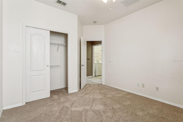 20606 Whitewood Way, Tampa, FL 33647 - unfurnished bedroom featuring light colored carpet, a closet, and baseboards