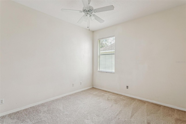 20606 Whitewood Way, Tampa, FL 33647 - empty room featuring light colored carpet, baseboards, and a ceiling fan