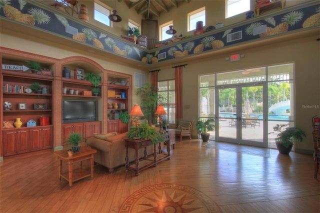 20606 Whitewood Way, Tampa, FL 33647 - common area with a high ceiling and beamed ceiling