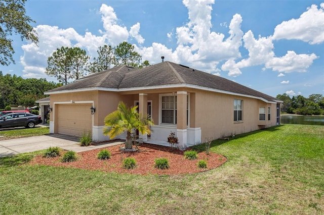 20606 Whitewood Way, Tampa, FL 33647 - view of front of home with a garage, stucco siding, a front yard, and driveway